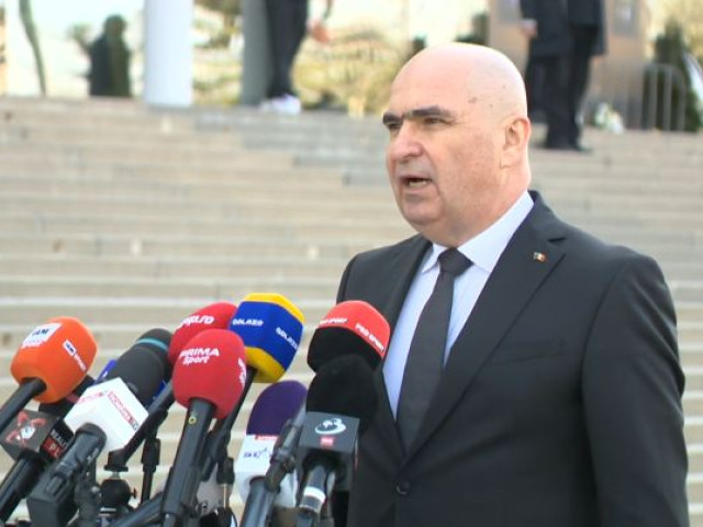 Ilie Bolojan a vorbit doar 15 secunde, după ce a vizitat catafalcul lui Mircea Lucescu